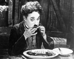 Charlie Chaplin eating non vegetarian food
